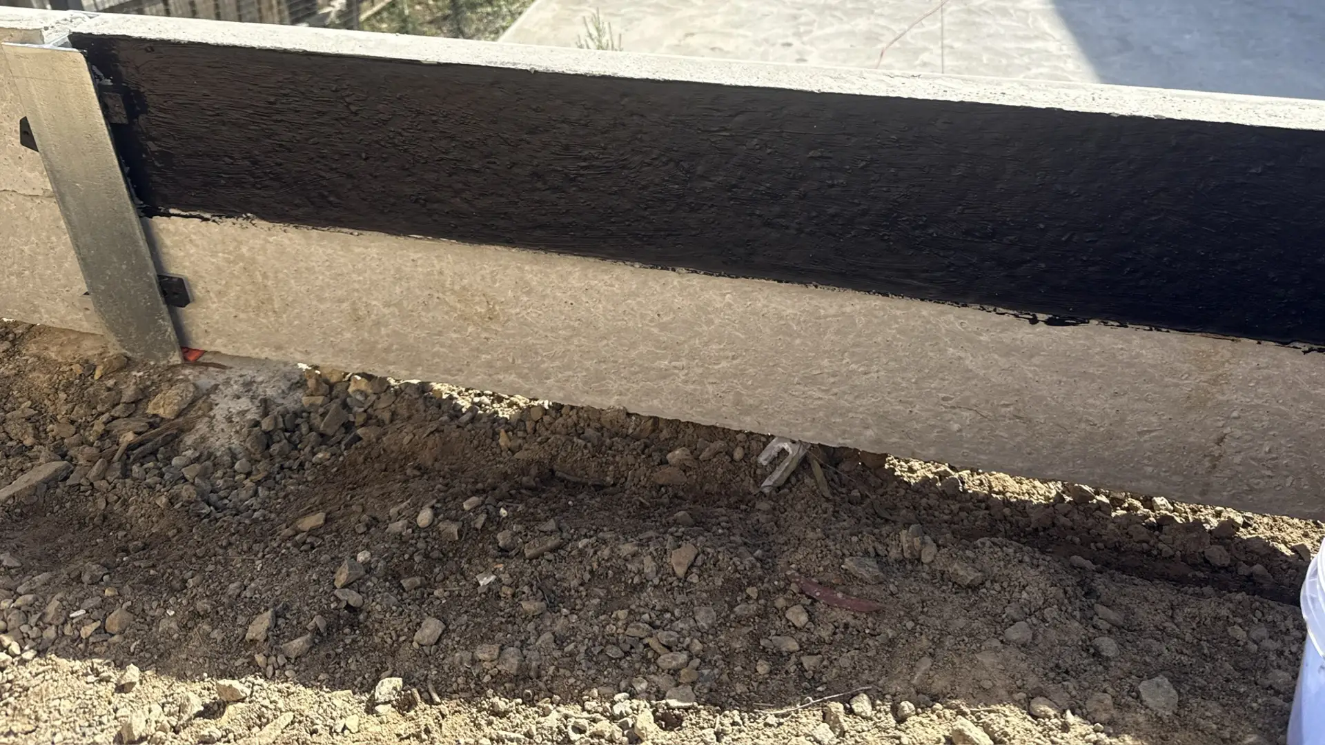 Retaining wall with Colorbond fence in Diamond Creek, VIC