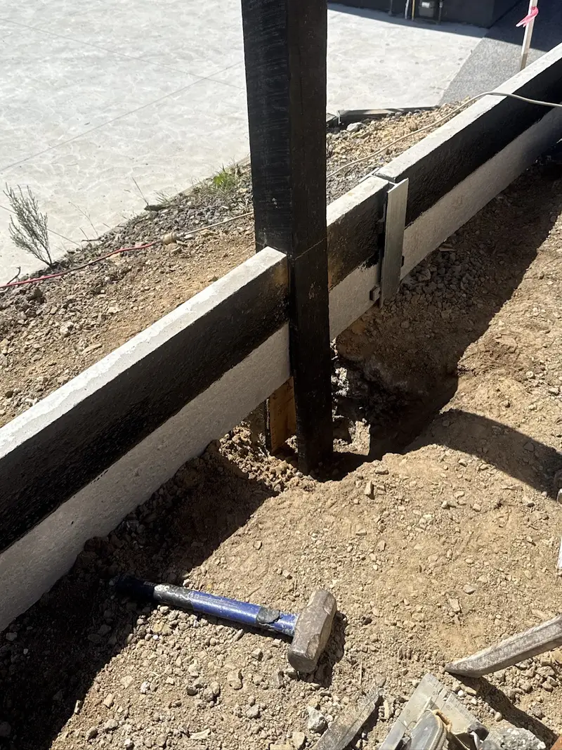 Retaining wall with Colorbond fence in Diamond Creek, VIC